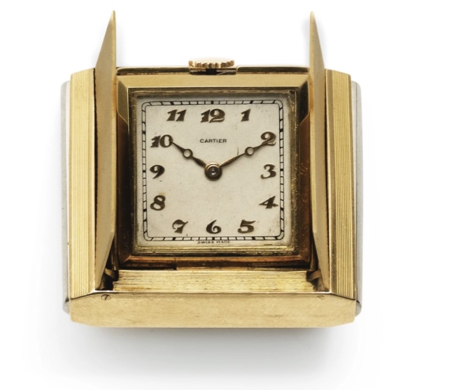 Sotheby's listing of the twin Cartier travel watch